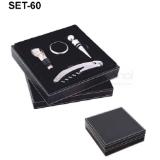 Set de accesorios metálicos para vino en estuche  de curpiel